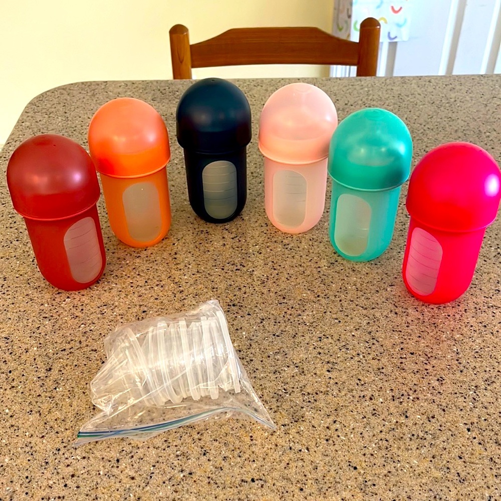 Six 8 oz silicone baby bottles